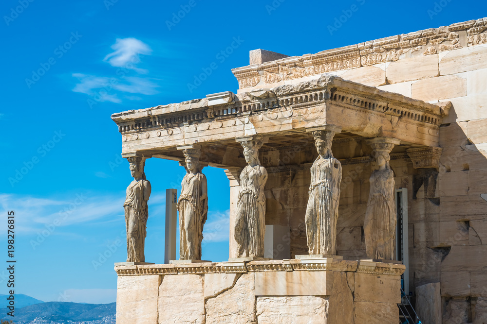 Fototapeta premium The Porch of the Caryatids at the Erechtheion temple on the Acropolis, Athens, Greece