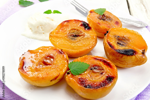 Wallpaper Mural Quince baked with ice-cream in plate on lilac napkin Torontodigital.ca