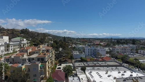 Aerial Flyover - Downtown Ventura - hillside view of city hall and apartments - flying forward