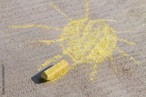 sun drawn on the sidewalk photo