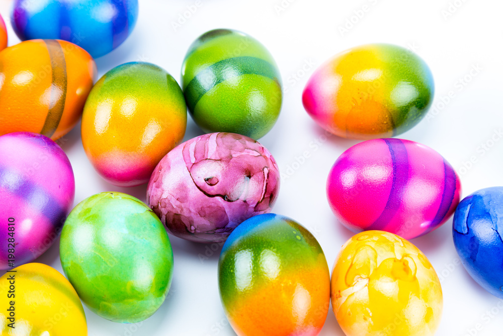 Tasty Colorful hand painted easter eggs with white background Tasty Colorful hand painted easter eggs with white background