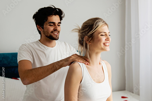 Man giving a head massage to a woman 