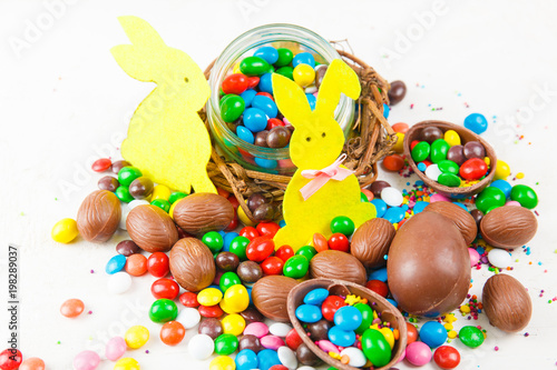 Chocolate eggs and color candy glaze © arybickii