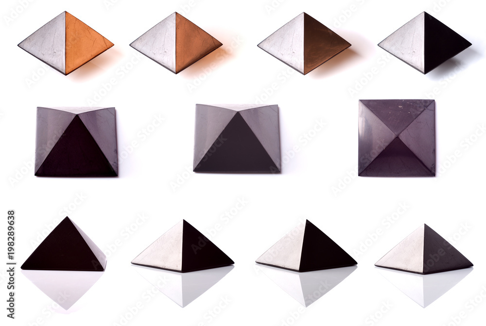 Pyramid of stone with different plans on a white background Pyramid of stone with different plans on a white background