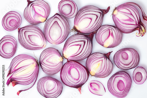 Sliced red onion on a white background