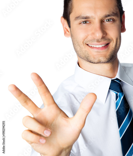 Businessman showing three fingers, isolated