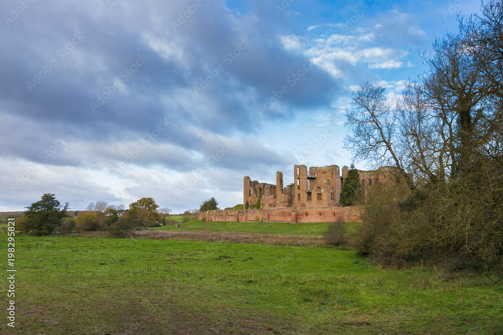 Ruined walls and towers of Kenilworth Castle on a bright Autumn day, Kenilworth, Warwickshire, England, UK, November 2017