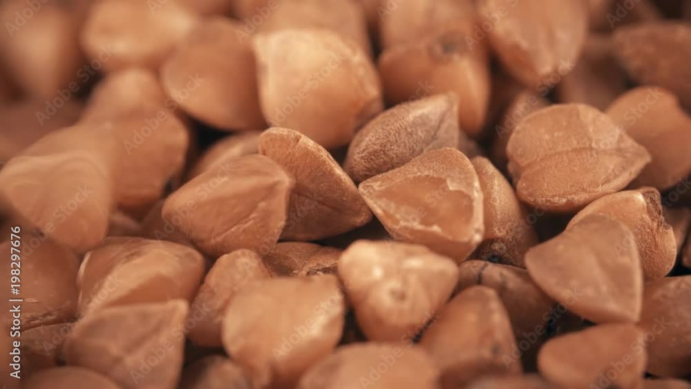 Pile of uncooked buckwheat super macro shot Pile of uncooked buckwheat super macro shot