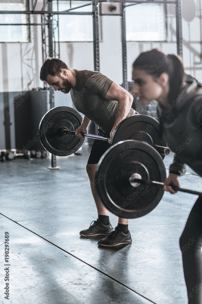 People Doing Workouts at Gym People Doing Workouts at Gym