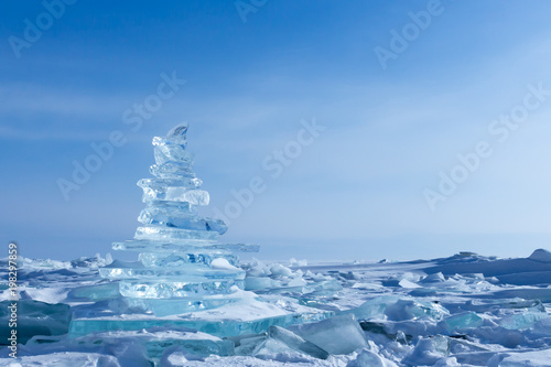 Winter Landscape. Crystal clear ice chunks. Pyramid of clear ice of Lake Baikal © alex_shi