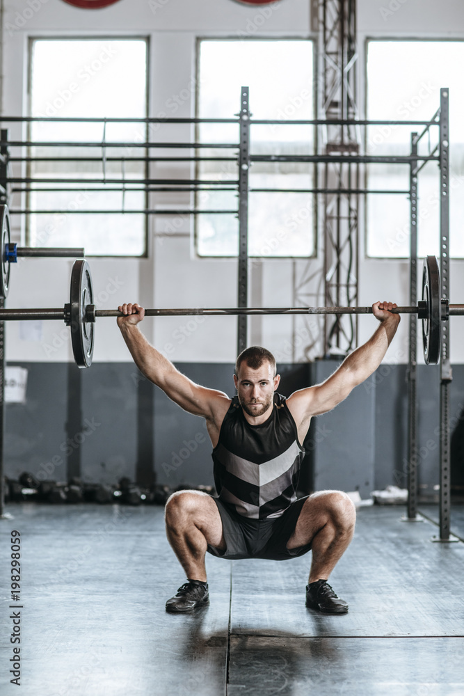 Sportsman Lifting Weights Sportsman Lifting Weights