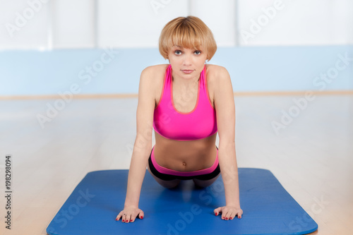 the girl is engaged in fitness