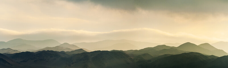 Rideaux Beige Amazing sunset sunrise and low clouds over the hills of Reserva Nacional La Chimba, as seen from La Portada  © Sebastian