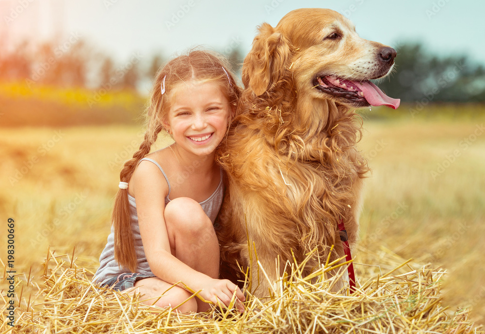 happy little girl with her dog