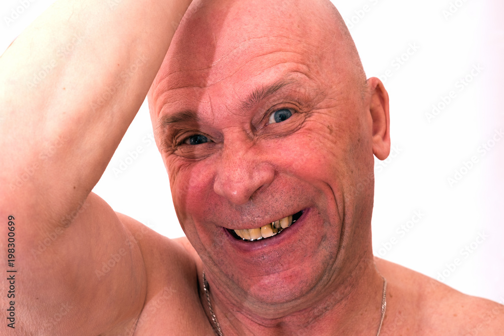 Obraz premium An elderly man smiles.