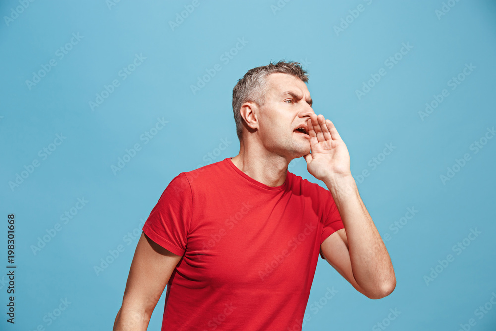 Isolated on pink young casual man shouting at studio Isolated on pink young casual man shouting at studio