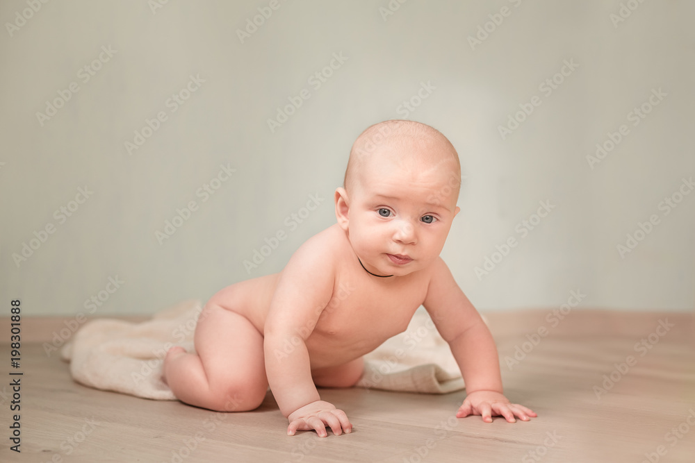 Cute happy baby boy crawling Cute happy baby boy crawling
