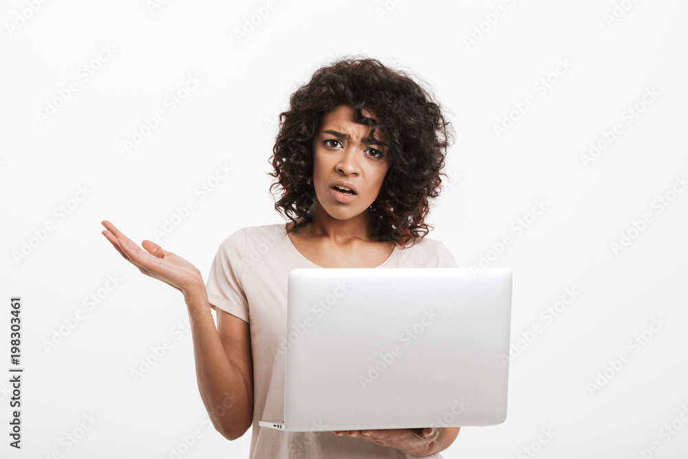 Portrait of confused young afro american woman Portrait of confused young afro american woman