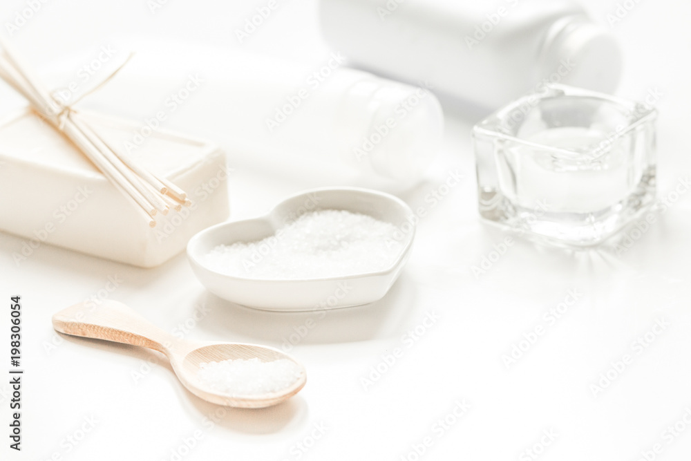 white set of cosmetics for spa on table background white set of cosmetics for spa on table background