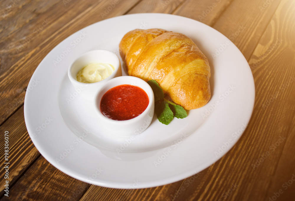 croissant on the wooden table croissant on the wooden table