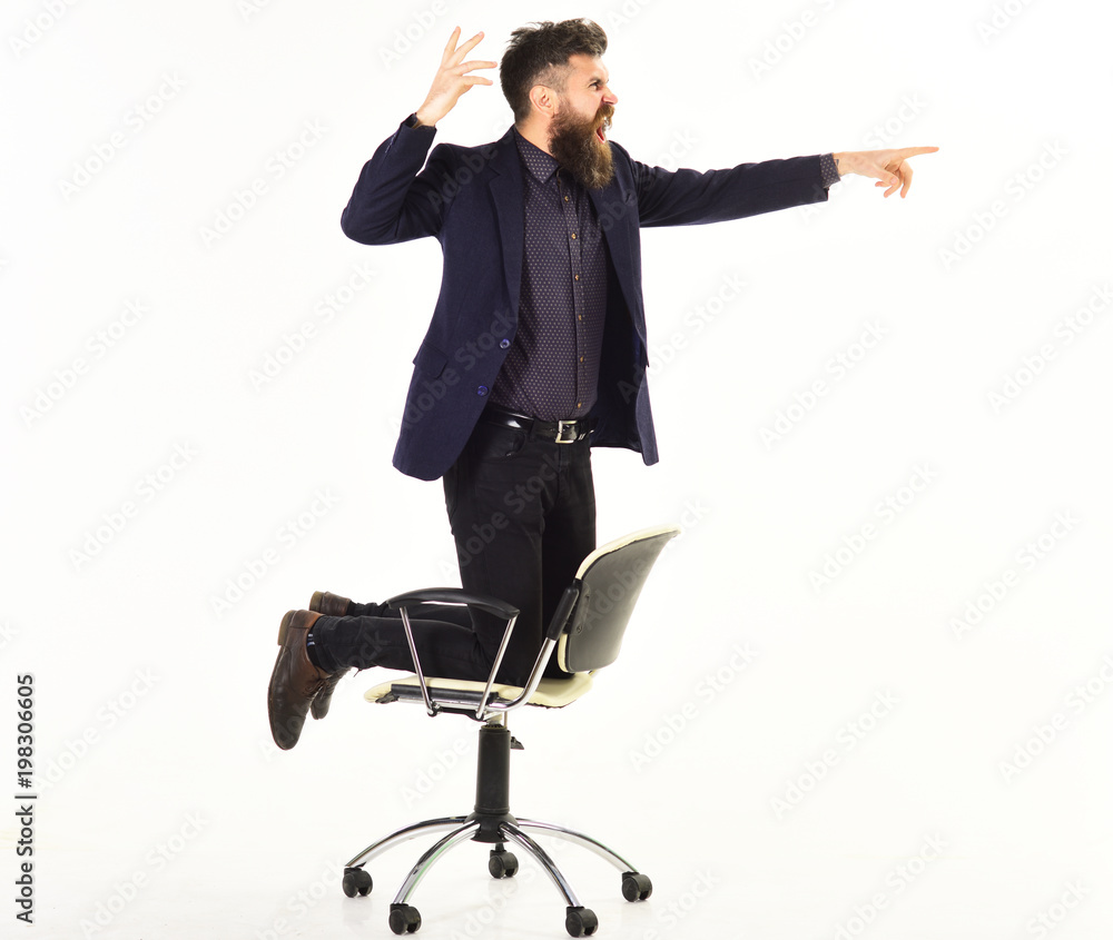 angry man with long beard accuses someone in a discussion