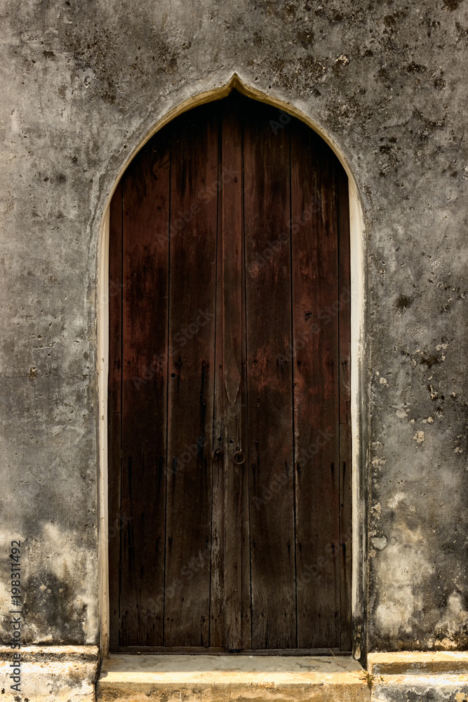The old wooden church door was closed.