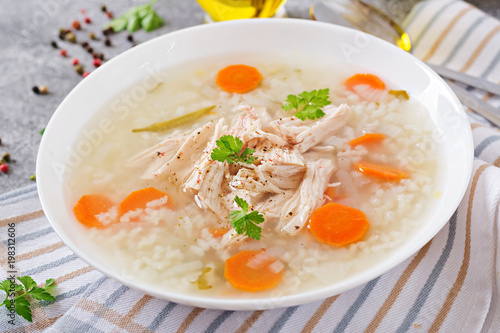 Dietary chicken soup with rice and carrots. Healthy food