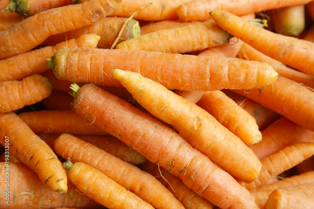 Crates of fresh carrots at Farmers' market Crates of fresh carrots at Farmers' market