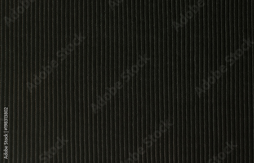 background of black cloth fabric . Photo of an abstract texture