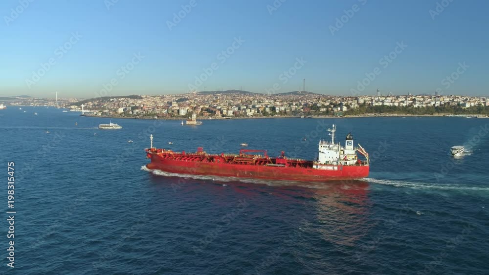 Ships floating Bosphorus blue water sunny day. Aerial drone view on sunset in Istanbul, Turkey Ships floating Bosphorus blue water sunny day. Aerial drone view on sunset in Istanbul, Turkey