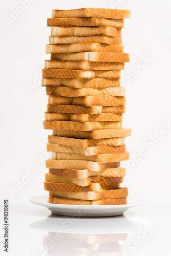 Wallpaper Mural Tower of toasted bread against a white background Torontodigital.ca