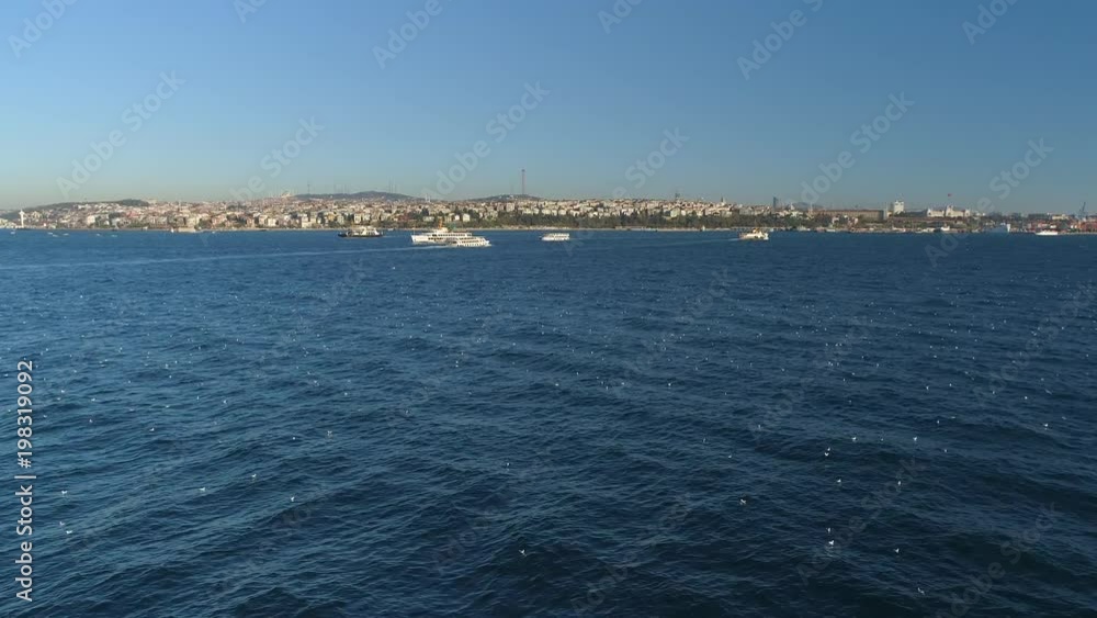 Ships floating Bosphorus blue water sunny day. Aerial drone view on sunset in Istanbul, Turkey Ships floating Bosphorus blue water sunny day. Aerial drone view on sunset in Istanbul, Turkey