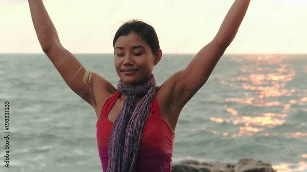 Healthy woman yoga meditating on beach. Harmony and yoga meditation concept Healthy woman yoga meditating on beach. Harmony and yoga meditation concept