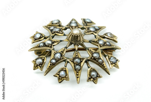 Antique Gold ladies Star Shaped Broach Diamond and Pearl Inlays.