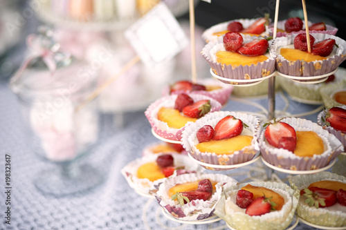 Outdoor wedding candy bar with french desserts