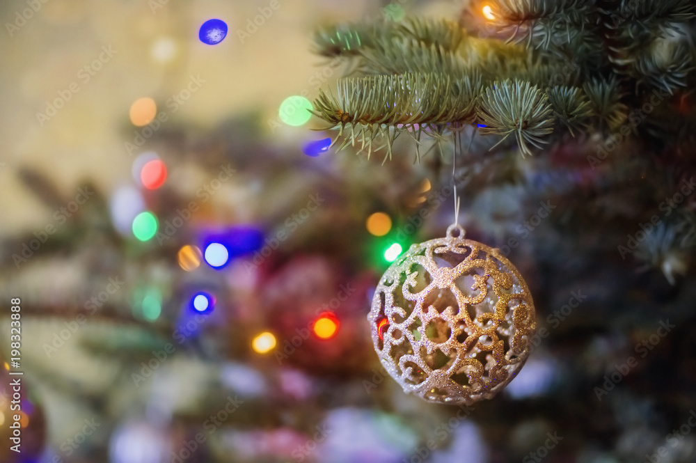 Obraz premium Christmas toy on a fir branch