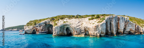 Fototapeta Tourist boats close to Blue caves at the cliff of Zakynthos island with, Greece,