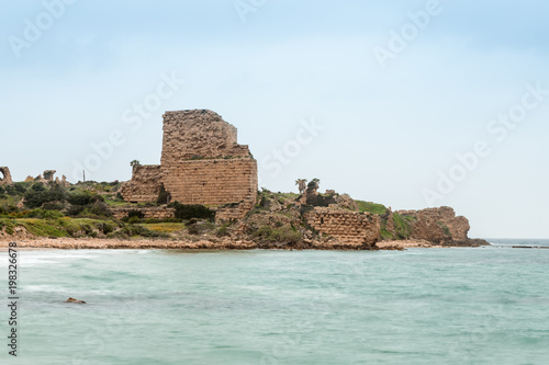 The ruins  of the Chateau Pelerin fortress built by the Knights Templar during the fifth Crusade in the beginning of the 13th century near the Atlit city in Israel photo