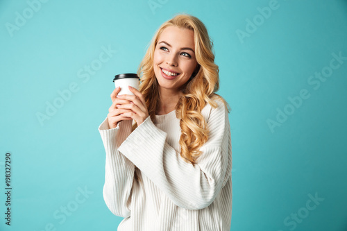 Portrait of a pretty young blonde woman in sweater