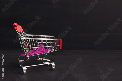 Shop cart on black background