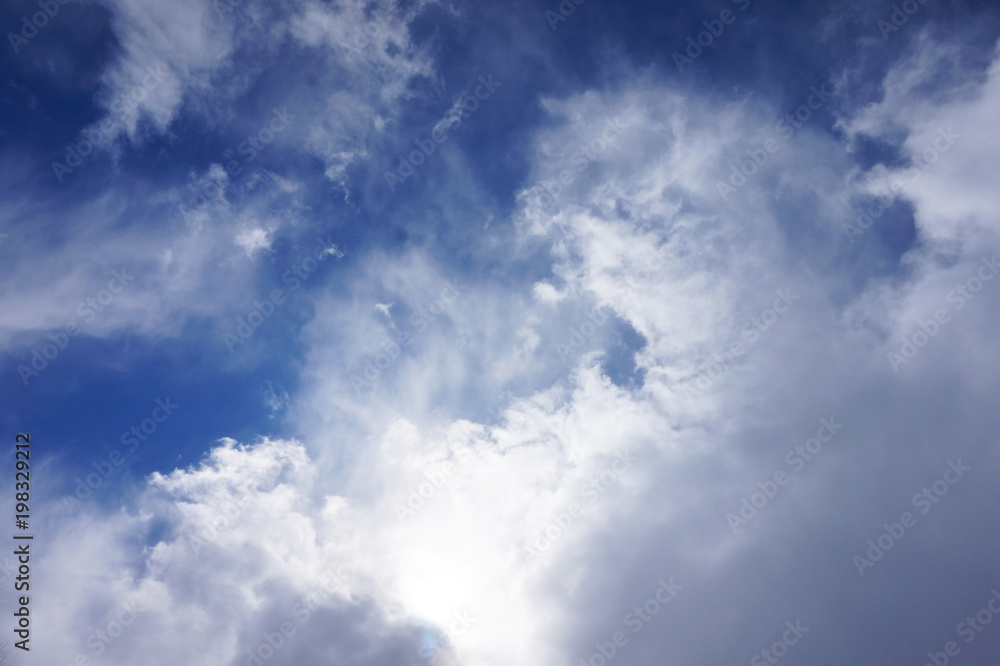 texture of the sky with large clouds and sun rays texture of the sky with large clouds and sun rays