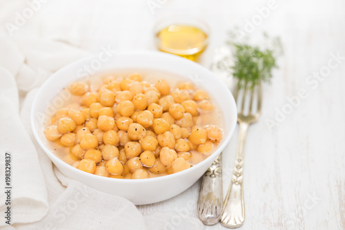 boiled chick-pea in white bowl