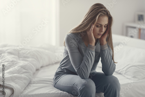 Young woman with migraine