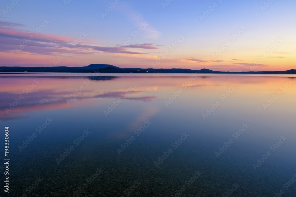 Beautiful sunset on the mountain lake