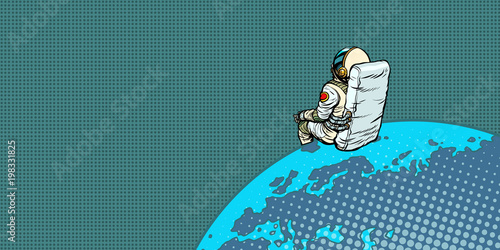 astronaut sits on the planet Earth