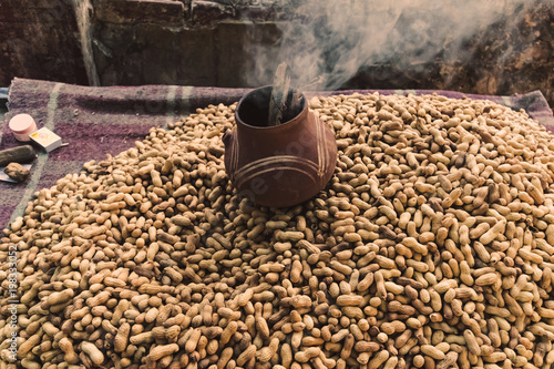 Photos Pile of raw peanuts on a street market in India
