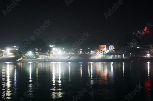 Ghats on shore river Ganges originates at Gangotri in Himalayas, photo