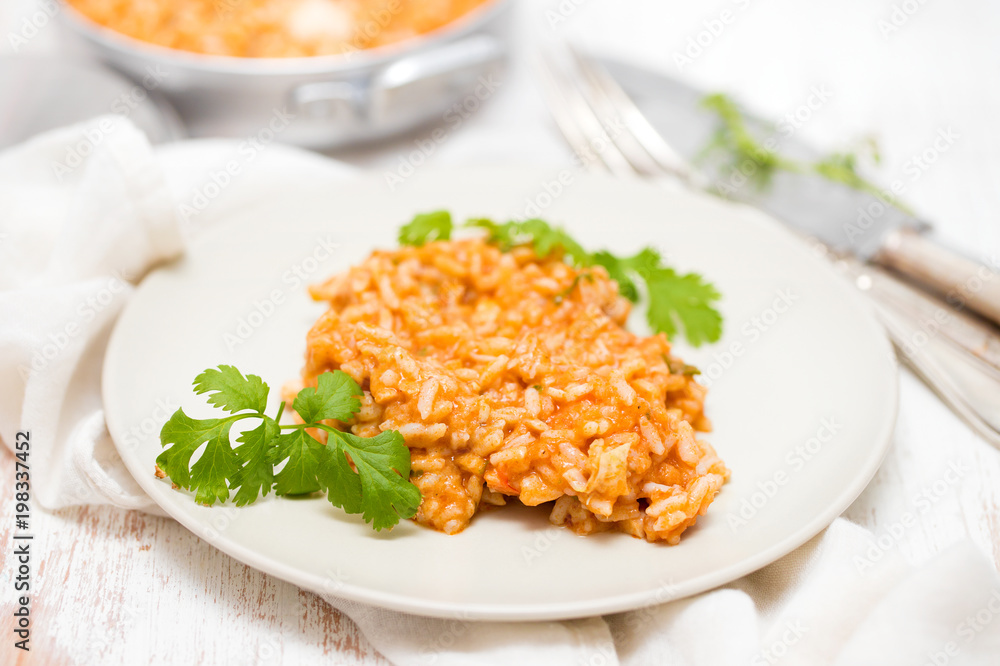 rice with fish and seafood on plate rice with fish and seafood on plate
