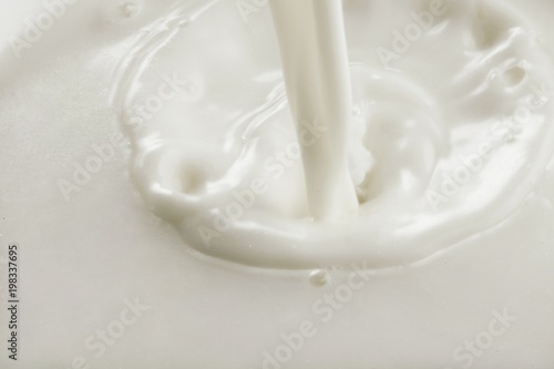 Pouring white Milk