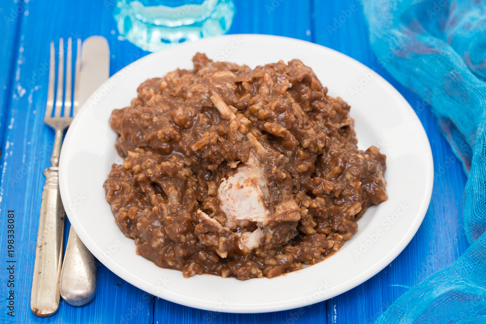 rice with rabbit on dish on wooden background rice with rabbit on dish on wooden background